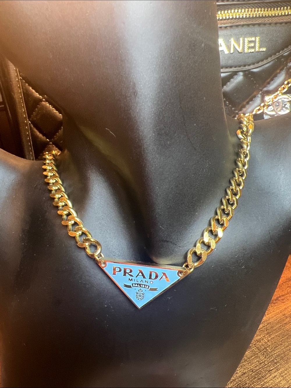 Gold Chain Necklace with Light Blue Triangle Logo Pendant